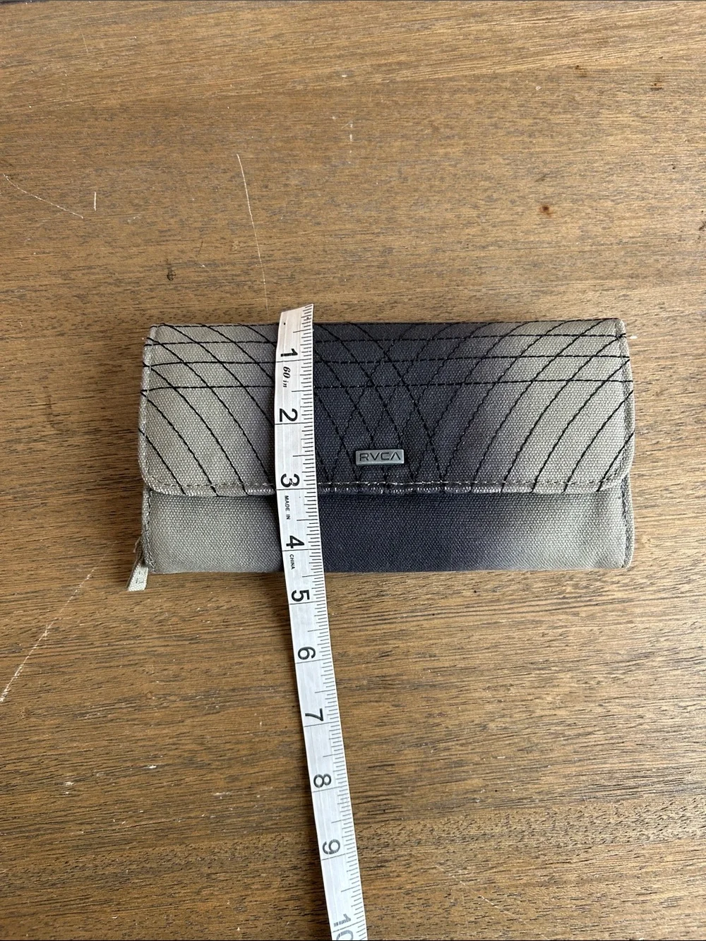 RVCA Canvas Fold-Over Women’s Wallet/Clutch. Features A Gray/Black Ombre Design.